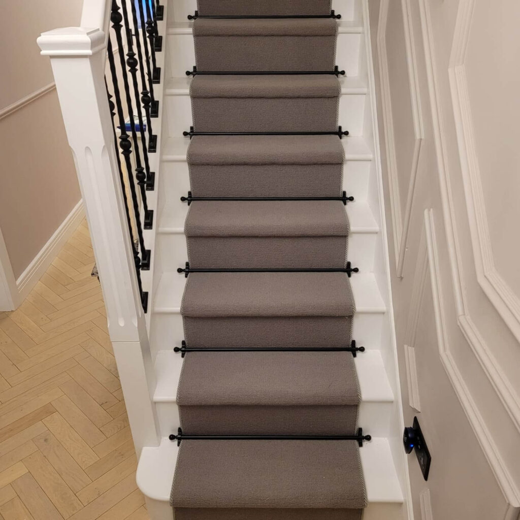 brown carpet fitted as a runner to stairs in york