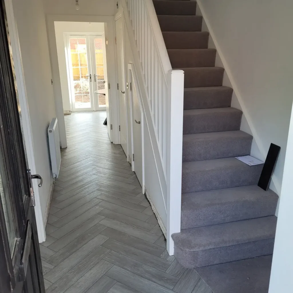 grey carpet on stairs complimenting hallway in york
