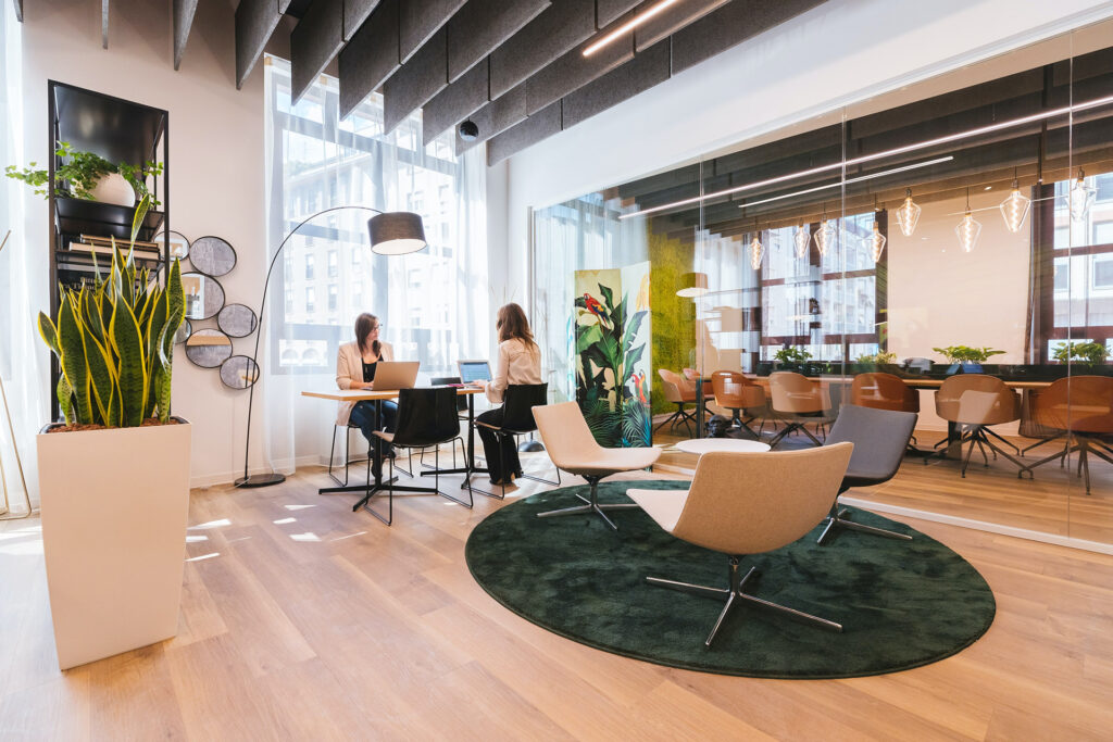 coworkers in a room fitted with the best office flooring