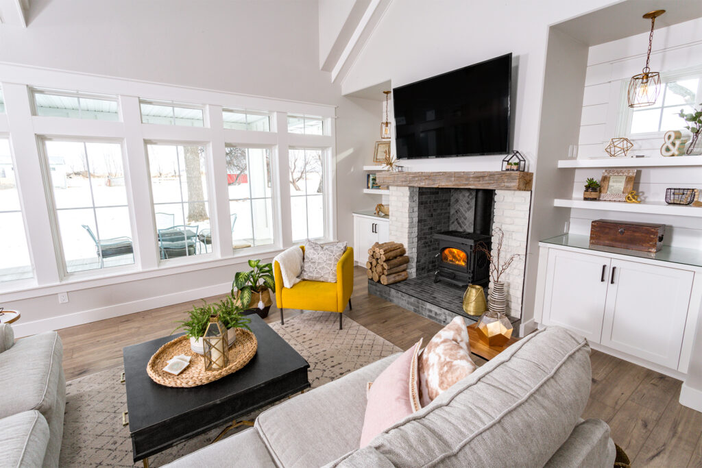a country style living room with a solid wood floor