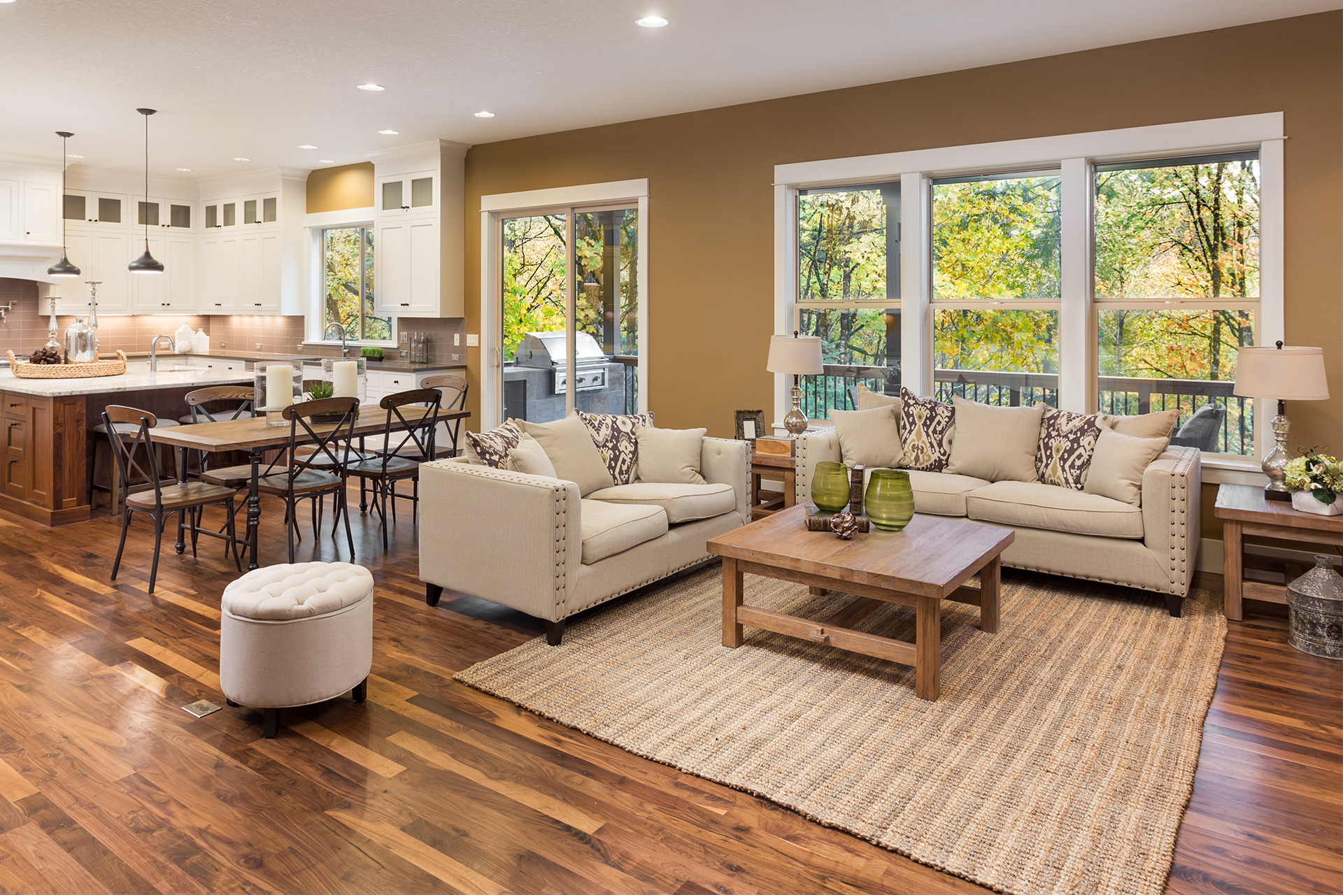 an example of best flooring for living area in a beautiful open plan space
