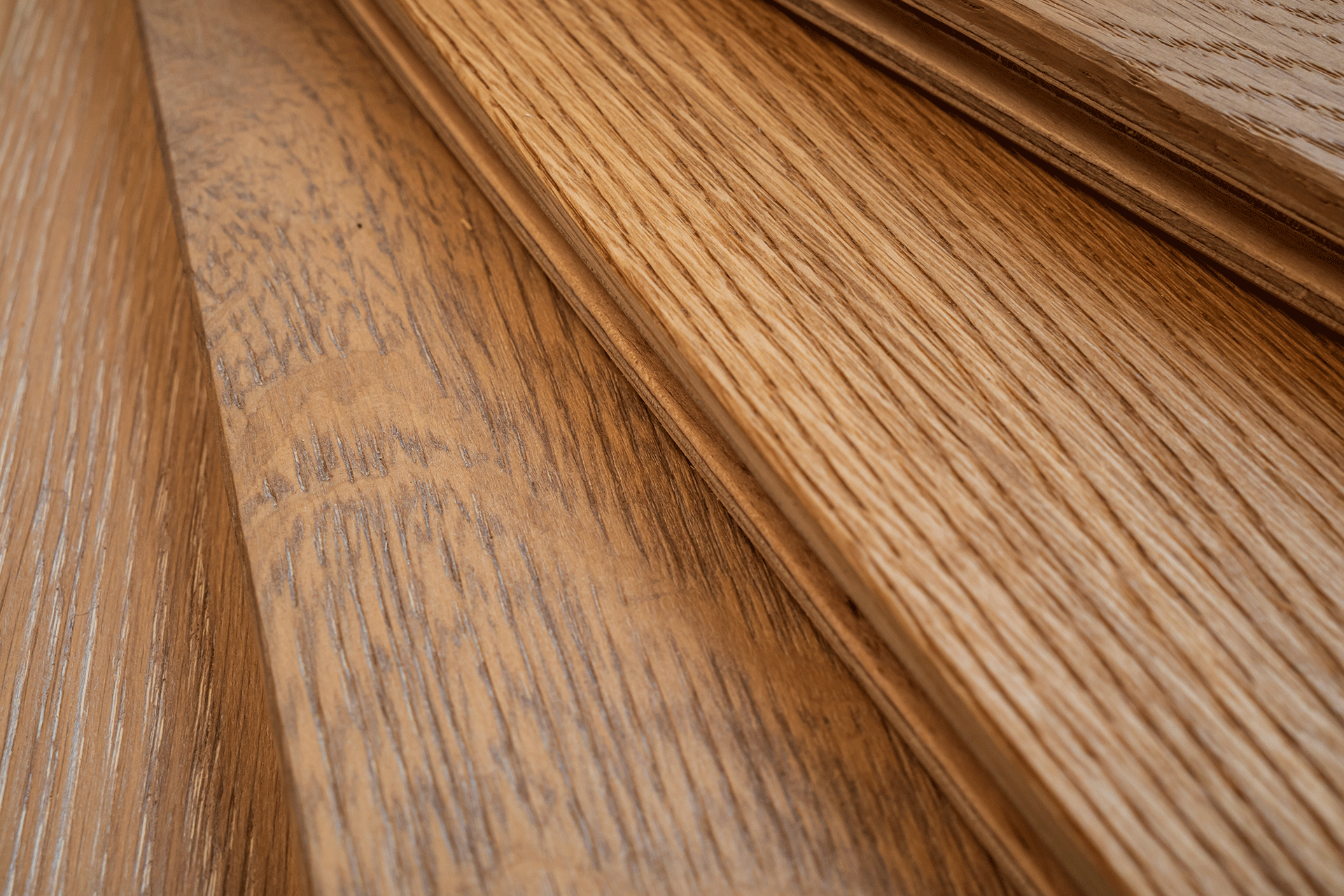 A closeup of engineered hardwood floor panels.